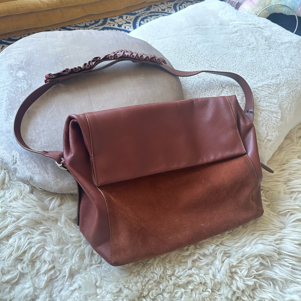 All Saints Maya leather and suede fold over bag